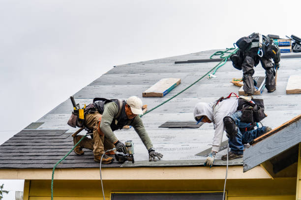Professional Gutter Installation technician working in Laguna Beach, FL